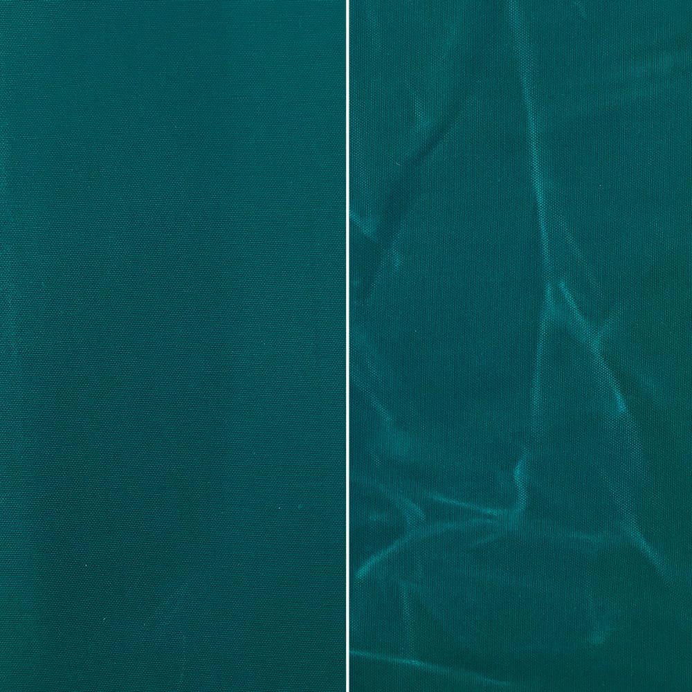 Fabric Funhouse Waxed Canvas in color Mermaid Teal, left side shows fabric smooth and right sized shows the appearance of creases once used
