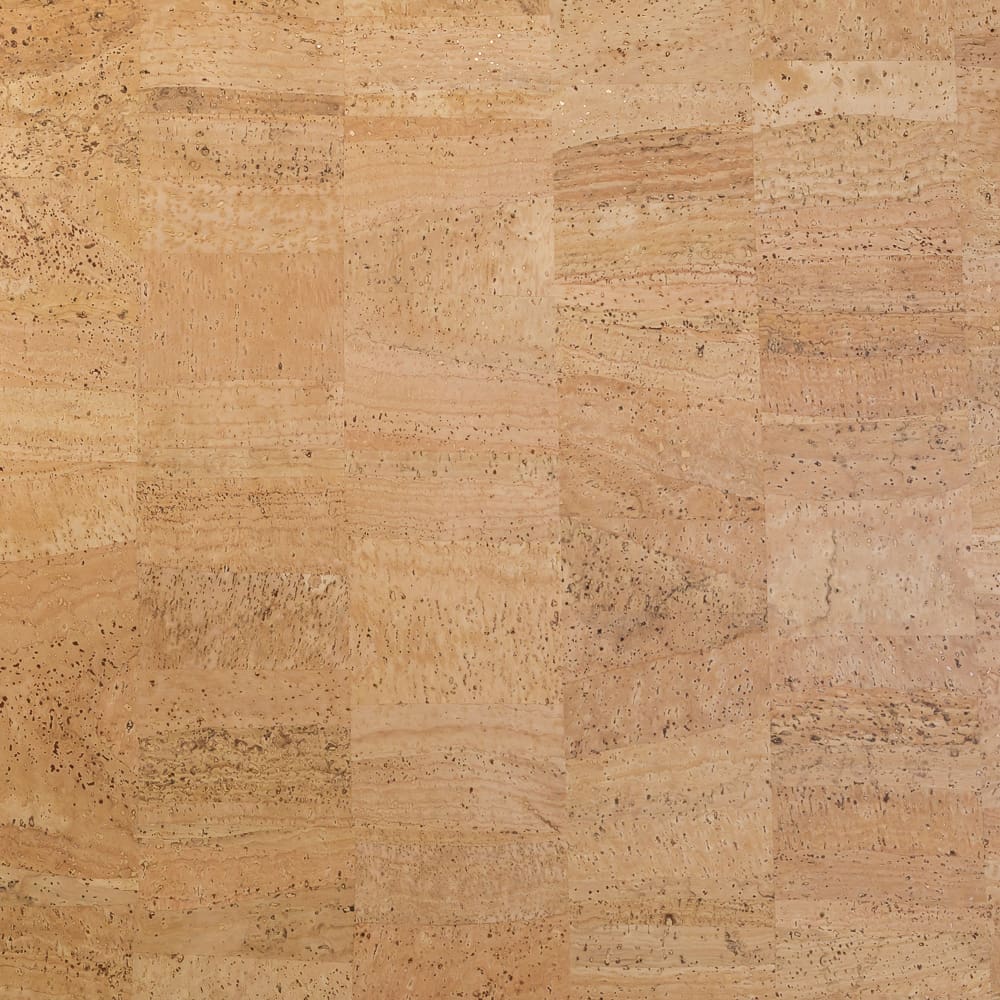 Fabric Funhouse Cork Fabric in Surface, which showcases blocks of processed cork which results in a smooth and buttery fabric that still exhibits natural beauty of cork